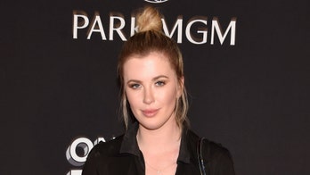 Ireland Baldwin puts chest on display while getting eye-popping makeup done