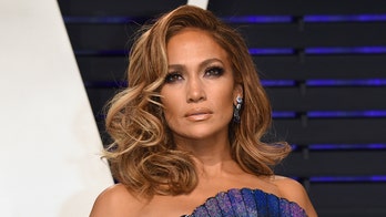 Jennifer Lopez breaks out iconic Versace dress for 'SNL': 'Some people say I look better now'