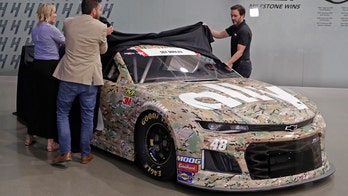Jimmie Johnson's camouflaged Camaro salutes fallen soldier