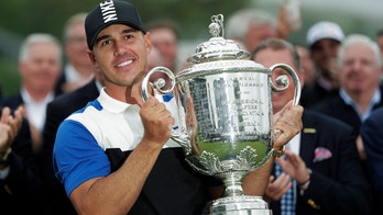 Brooks Koepka survives late stumble to retain PGA Championship by 2 shots, after starting day 7 ahead