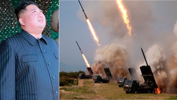 North Korea's Kim Jong Un oversees testing of multiple rocket launchers, tells troops to 'keep high alert posture'