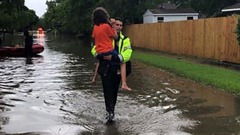 Houston rain, floodwaters prompt rescues as hundreds left stranded