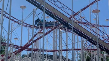 Panic strikes as school children get stuck near top of roller coaster