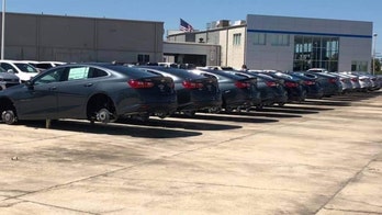 Crooks steal wheels and tires from dozens of vehicles on dealer lot