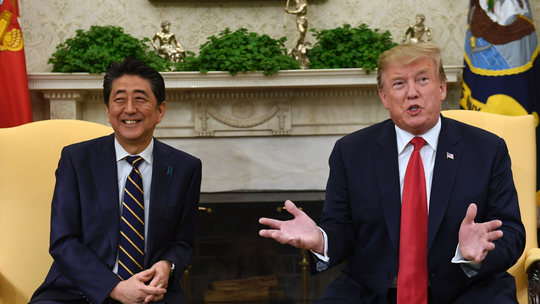 Japan welcomes Trump with a charm campaign, golf and sumo