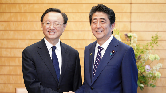 Japan, China agree to boost relations ahead of Xi visit