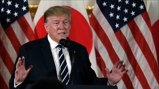 Trump downplays North Korean missile tests