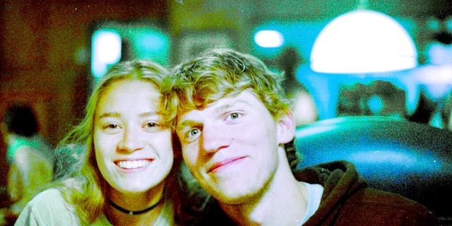 In this Sept. 1, 2017 photo provided by Matthew Westmoreland, Riley Howell, right, is seen.
