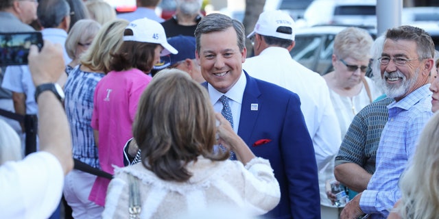Fox News' Ed Henry chats with fans before the Fox Nation summit Tuesday in Arizona.