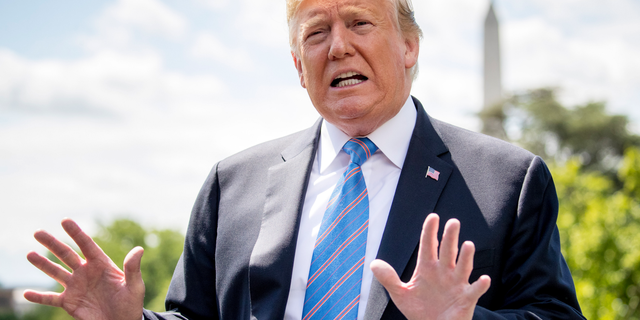 President Donald Trump speaks to members of the media on the South Lawn of the White House in Washington, Tuesday, May 14, 2019, before boarding Marine One for a short trip to Andrews Air Force Base, Md., to travel to Louisiana. (AP Photo/Andrew Harnik)