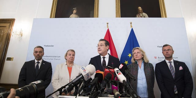 Austrian Vice Chancellor Heinz-Christian Strache (Austrian Freedom Party), center, addresses the media during press conference at the sport ministry in Vienna, Austria, Saturday, May 18, 2019. Strache says he is resigning after two German newspapers published footage of him apparently offering lucrative government contracts to a potential Russian benefactor.