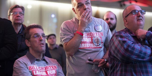 Labor party supporters watch the tally count at the Federal Labor Reception in Melbourne, Australia, Saturday, May. 18, 2019. Voting has closed in Australia's general election, with some senior opposition lawmakers confident that they will form a center-left government with a focus on slashing greenhouse gas emissions.