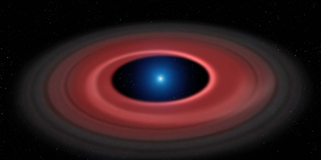 This illustration shows a ring of dust particles and debris orbiting the burnt-out stellar core called a white dwarf.
