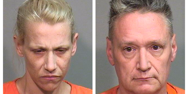 FILE - This combination of undated photos provided by the McHenry County Sheriff's Department in Woodstock, Ill., on Thursday, April 25, 2019 shows JoAnn Cunningham, left, and Andrew Freund Sr. Video recovered from an Illinois woman's cellphone that shows her 5-year-old son bruised and bandaged prompted the boy's father to lead investigators to the boy's body, according to court records released Wednesday, May 1. Cunningham and Freund are charged with murder in Andrew "AJ" Freund's death. (McHenry County Sheriff's Department via AP, File)