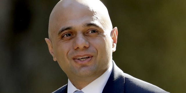 FILE - In this Tuesday, May 1 , 2018 file photo, Britain's newly appointed Home Secretary Sajid Javid arrives for a cabinet meeting at 10 Downing Street in London. Prime Minister Theresa May’s announcement that she will leave 10 Downing Street has set off a fierce competition to succeed her as Conservative Party leader _ and as the next prime minister.