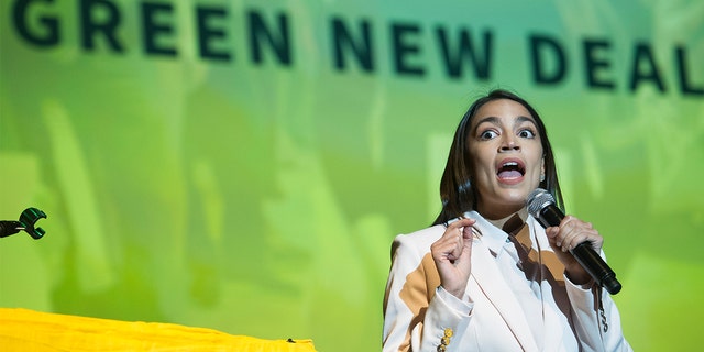 Rep. Alexandria Ocasio-Cortez, D-N.Y., addresses the Road to the Green New Deal Tour final event at Howard University in Washington, Monday, May 13, 2019. (AP Photo/Cliff Owen)