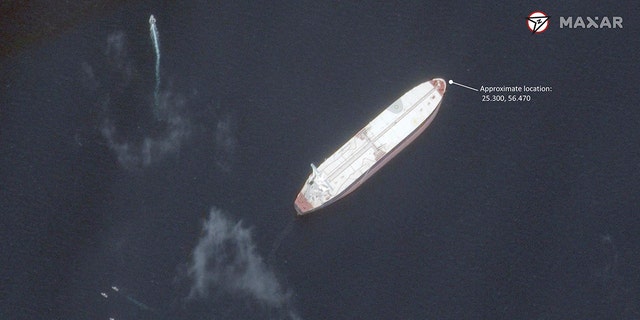 This satellite image provided by Maxar Technologies shows the Saudi-flagged oil tanker Amjad off the coast of Fujairah, United Arab Emirates, Monday, May 13, 2019. As many as four oil tankers anchored in the Mideast were damaged in what Gulf officials described Monday as a "sabotage" attack off the coast of the United Arab Emirates. (Satellite image ©2019 Maxar Technologies via AP)