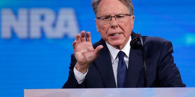 Nation Rifle Association Executive Vice President Wayne LaPierre speaks at the National Rifle Association Institute for Legislative Action Leadership Forum in Lucas Oil Stadium in Indianapolis. (AP Photo/Michael Conroy)