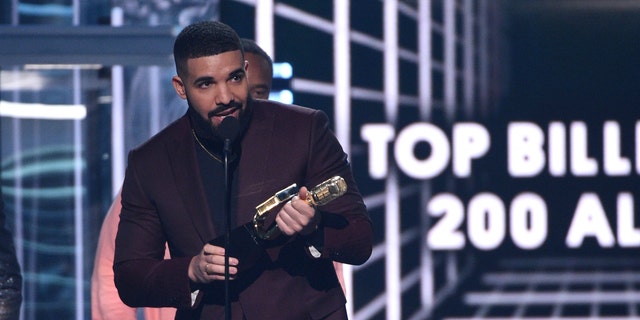 Drake accepts the award for Best Album 200 