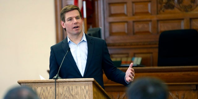 Presidential hopeful U.S. Rep. Eric Swalwell, D-Calif., speaks during a Law Day event at the Dubuque County Courthouse on Friday, May 3 in Dubuque, Iowa. (Dave Kettering/Telegraph Herald via AP)