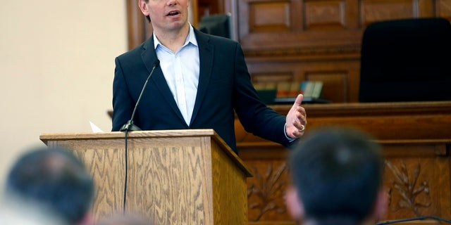 Presidential hopeful U.S. Rep. Eric Swalwell, D-Calif., speaks during a Law Day event at the Dubuque County Courthouse on Friday, May 3 in Dubuque, Iowa. (Dave Kettering/Telegraph Herald via AP)