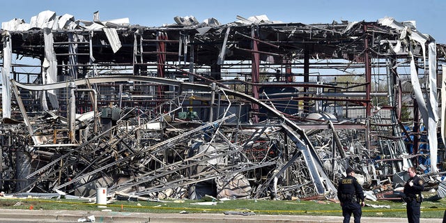 Emergency personnel work on the scene of an explosion at AB Specialty Silicones at Sunset Ave. and Northwestern Ave. on the border between Gurnee, Illinois and Waukegan, Saturday, May 4, 2019. The explosion occurred Friday night. (Associated Press)
