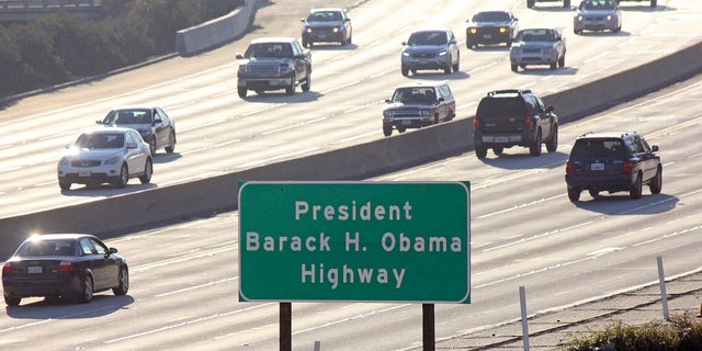 On this Thursday, December 20, 2018, photo of the folder, signs indicating the location of a highway section of the Los Angeles area designating the name of President Barack H. Obama Highway, seen from Pasadena , California, (Associated Press)