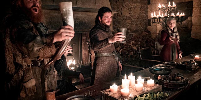 This image released by HBO shows Kristofer Hivju, from left, Kit Harington and Emilia Clarke in a scene from "Game of Thrones."