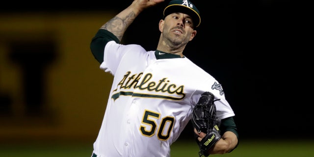 Oakland Athletics pitcher Mike Fiers works against the Cincinnati Reds during the first inning of a baseball game Tuesday, May 7, 2019, in Oakland, Calif. (Associated Press)