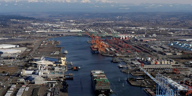 In this March 5, 2019 photo, a cargo ship arrives at the Port of Tacoma, in Tacoma, Wash. U.S. and Chinese negotiators resumed trade talks Friday, May 10, 2019, under increasing pressure after President Donald Trump raised tariffs on $200 billion in Chinese goods and Beijing promised to retaliate. (Associated Press)