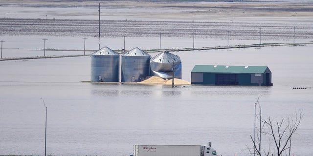 Grain bins stand in floodwaters from the Missouri River, in Hamburg, Iowa, on May 10. (AP Photo/Nati Harnik, File)