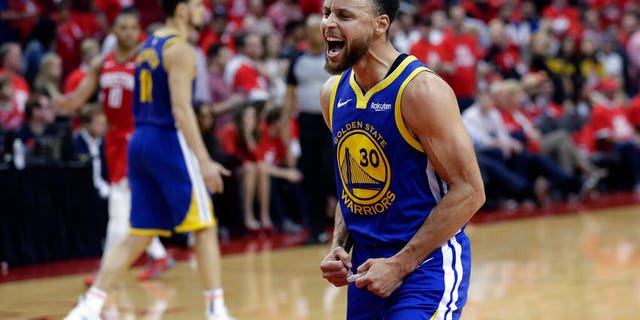 Golden State Warriors guard Stephen Curry (30) celebrates the team's win over the Houston Rockets in Game 6 of a second-round NBA basketball playoff series, Friday, May 10, 2019, in Houston. Golden State won 118-113, winning the series. (AP Photo/Eric Gay)
