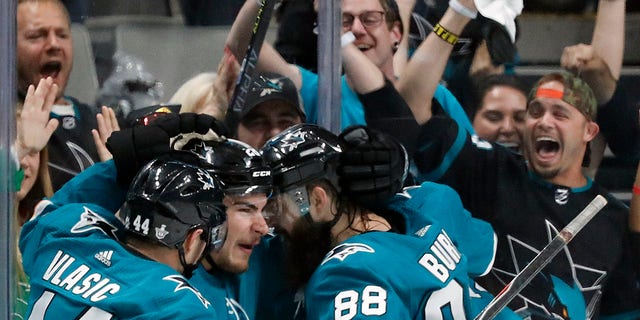 San Jose Sharks' Marc-Edouard Vlasic (44), Timo Meier (28) and Brent Burns (88) celebrate a goal by Meier against the St. Louis Blues in the second period in Game 1 of the NHL hockey Stanley Cup Western Conference finals in San Jose, Calif., on Saturday. (Associated Press)