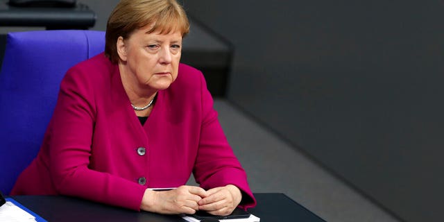 German Chancellor Angela Merkel attends a debate at the Reichstag building in Berlin, Germany, Thursday, May 16, 2019.