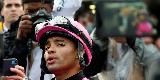 Jockey Luis Saez reacts after Maximum Security was disqualified from the 145th running of the Kentucky Derby horse race at Churchill Downs in Louisville, Ky., on May 4. Saez has appealed his 15-day suspension by the Kentucky Horse Racing Commission. He says the stewards' penalty for failing to control the horse in the Kentucky Derby is "unduly harsh and not supportable by facts and law." The rider also seeks to stay his suspension pending appeal to fulfill riding commitments. (AP Photo/Morry Gash, File)