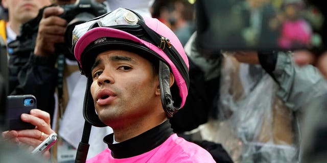 Jockey Luis Saez reacts after Maximum Security was disqualified from the 145th running of the Kentucky Derby horse race at Churchill Downs in Louisville, Ky., on May 4. Saez has appealed his 15-day suspension by the Kentucky Horse Racing Commission. He says the stewards' penalty for failing to control the horse in the Kentucky Derby is 