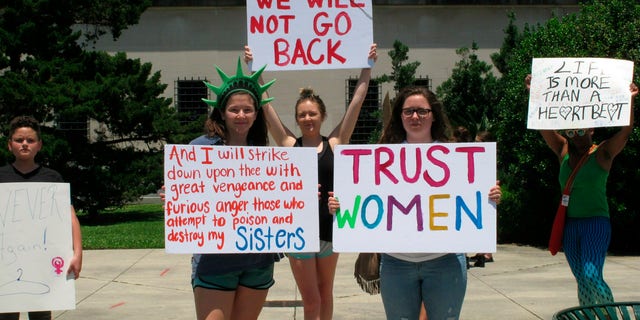 Pro-choice women protest at the Louisiana Capitol, where lawmakers passed bill that would ban abortion as early as six weeks of pregnancy, on Tuesday, May 21, 2019, in Baton Rouge, La. (AP Photo/Melinda Deslatte)