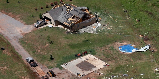 A house damaged in a tornado Monday in Mangum, Oklahoma. (AP Photo/Sue Ogrocki)