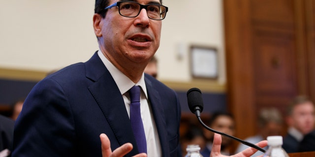 Treasury Secretary Steven Mnuchin testifies before the House Committee on Financial Services on Capitol Hill in Washington. (AP Photo/Carolyn Kaster)