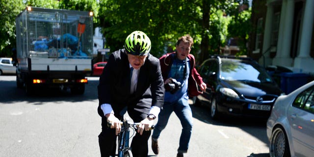 Politician Boris Johnson leaves his home, on the day of the European Parliament elections, in London, Thursday May 23, 2019.