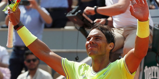 Spain's Rafael Nadal celebrates winning against Germany's Yannick Hanfmann in three sets 6-2, 6-1, 6-3, during their first round match of the French Open tennis tournament at the Roland Garros stadium in Paris, Monday, May 27, 2019. (AP Photo/Pavel Golovkin)