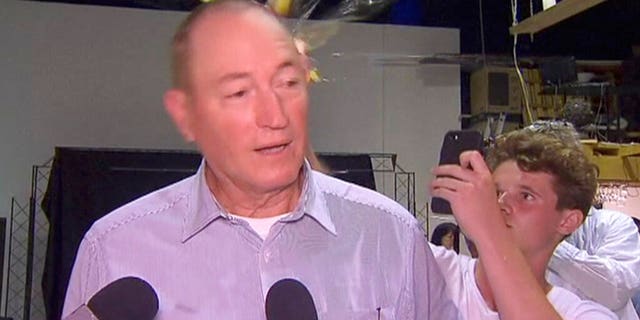Will Connolly, pictured here, breaks an egg on the head of Senator Fraser Anning while he holds a press conference, in Melbourne.