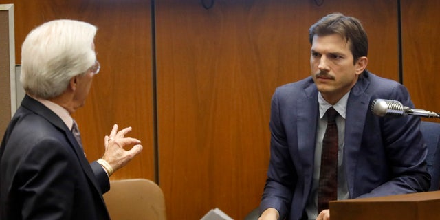 Defense Attorney Daniel Nardoni, left, questions Ashton Kutcher during his testimony in the murder trial of Michael Gargiulo.