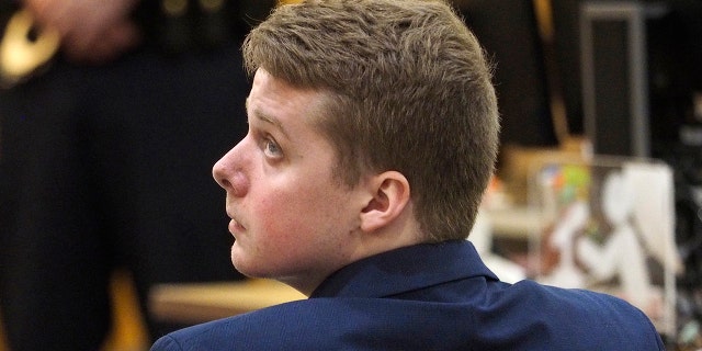 Defendant Liam McAtasney listens as his attorney Carlos Diaz-Cobo addresses the jury during closing arguments in Monmouth County Superior Court, Friday, Feb. 22, 2019 in Freehold, N.J.. (Patti Sapone/NJ Advance Media via AP, Pool)