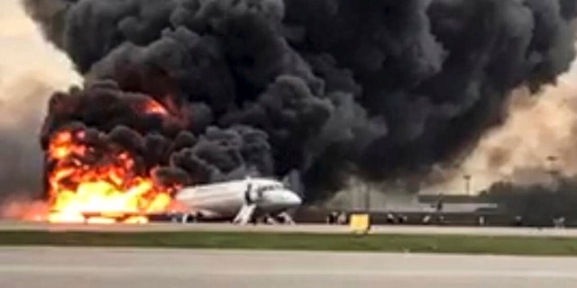 This image taken from a video distributed by Russian Investigative Committee on Sunday, May 5, 2019, shows the Sukhoi SSJ100 aircraft of Aeroflot Airlines on fire, at Sheremetyevo airport, outside Moscow, Russia.