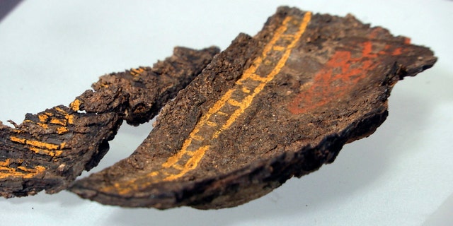 A painted wooden box fragment, claimed to be the only surviving example of early Anglo-Saxon painted woodwork, on display at Southend Central Museum in Southend, England, Thursday, May 8, 2019.