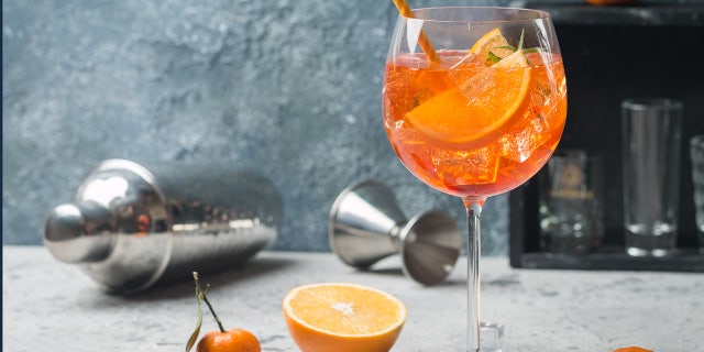 A cocktail in a glass as well as fresh fruit is shown there. Brian Morgenstern and Teresa Davis say they tested their citrus sangria recipe on friends before putting it in their book: "It was a huge hit."