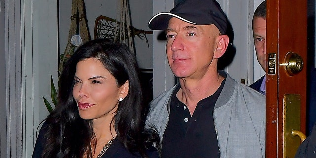 Jeff Bezos and Lauren Sanchez are seen together in NYC after having dinner together.