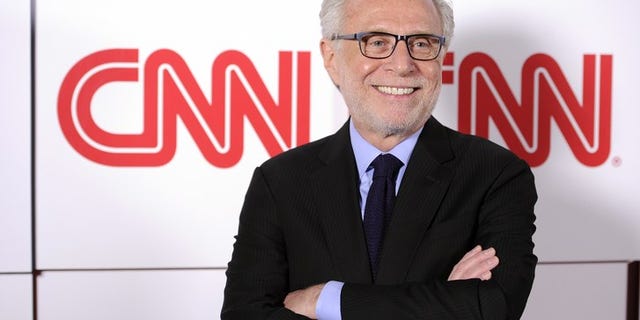 CNN anchor Wolf Blitzer helped delay Iowa Caucus results when distracted precinct captain stayed on the phone with him instead of reporting results.