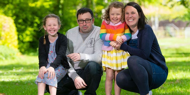 Rachel Avon, with her daughters Ffion (left) and Carl, and her partner Ross, said that she would never have known that she was suffering from rare cancer if her unborn baby was growing up not on the tumor to cause pain.